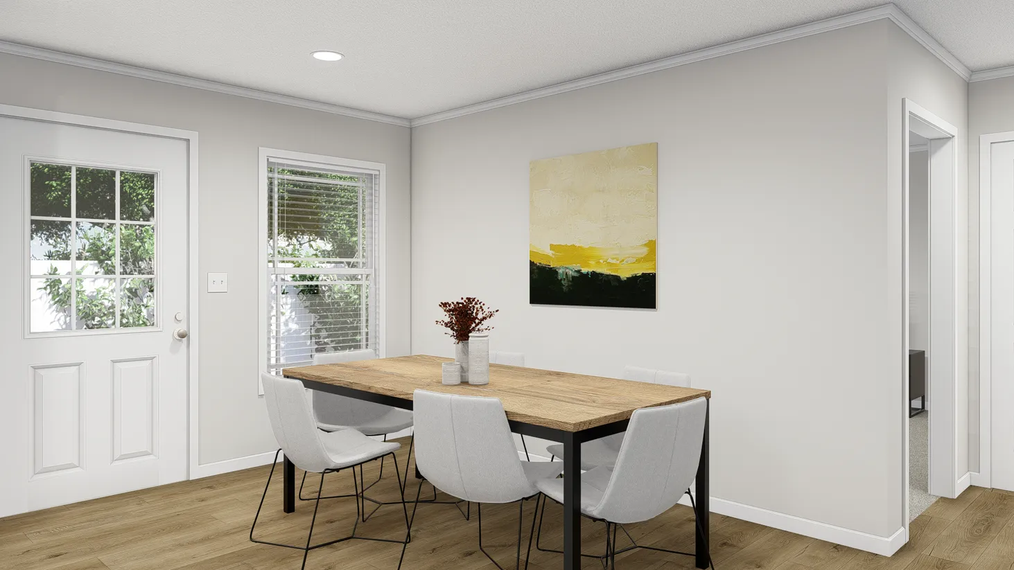 Dining room with wooden table and white chairs