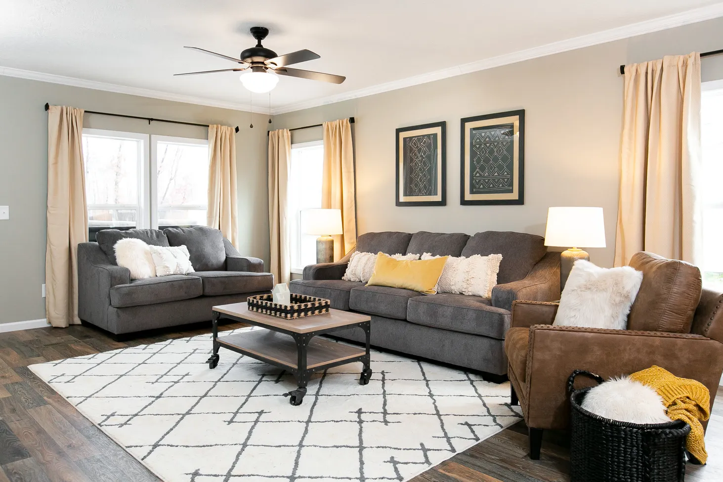 Large living room with a couch, chair, and loveseat