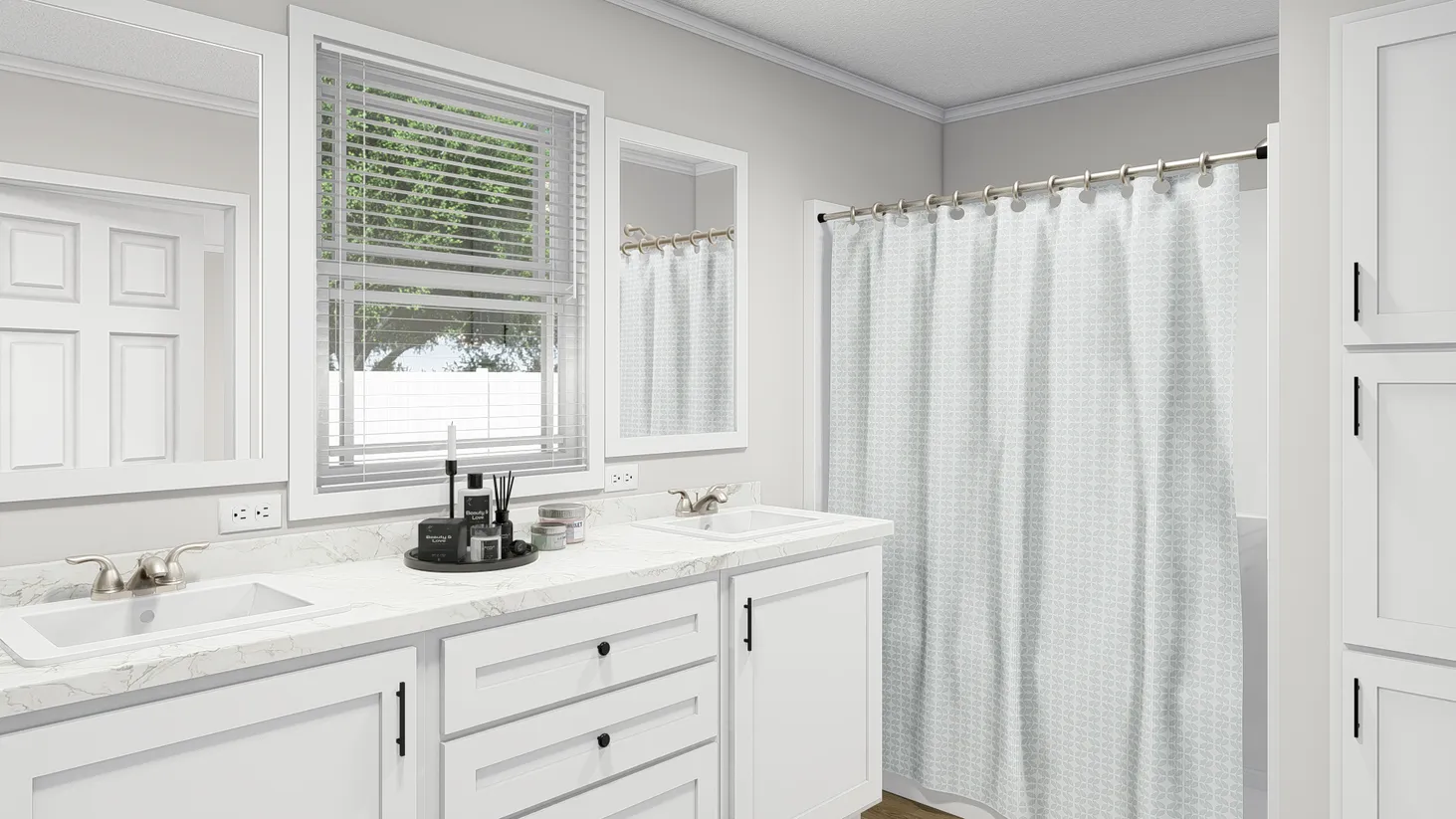White-themed bathroom with double sinks and large countertop