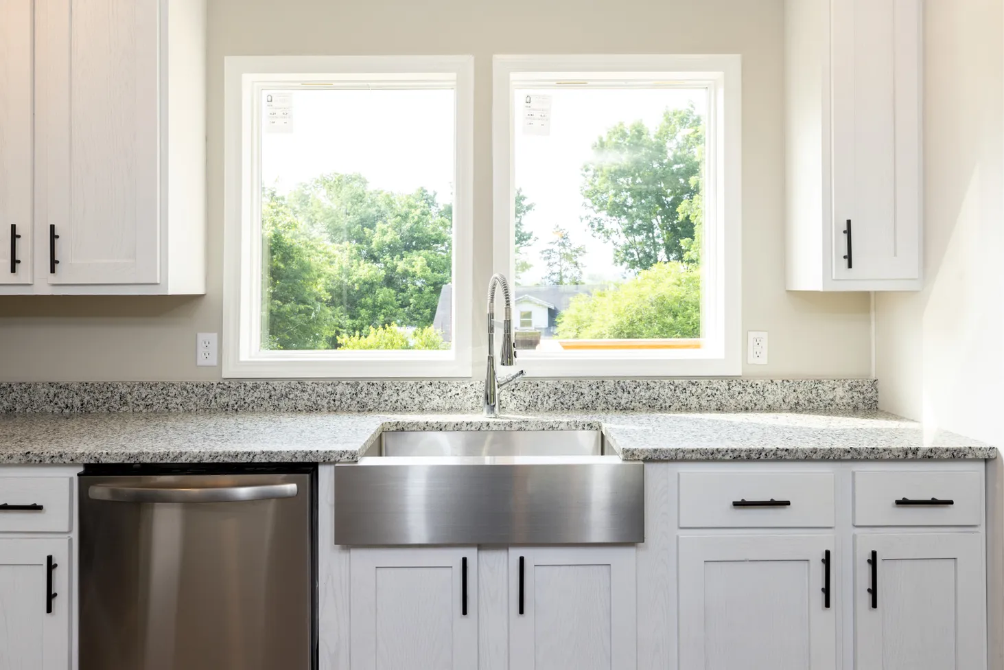 Close-up of farmhouse sink with view out of window