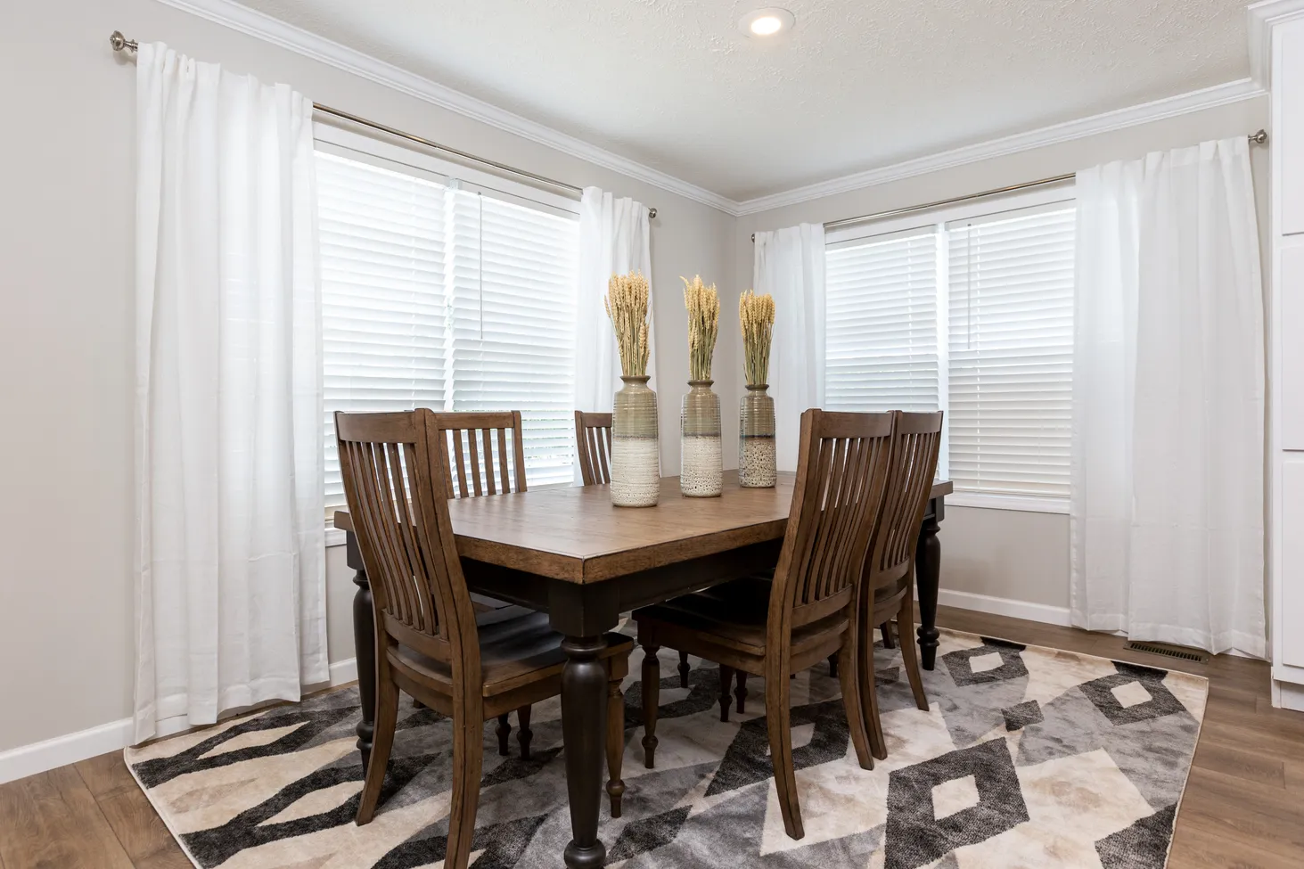 Dining room with table that seats six people