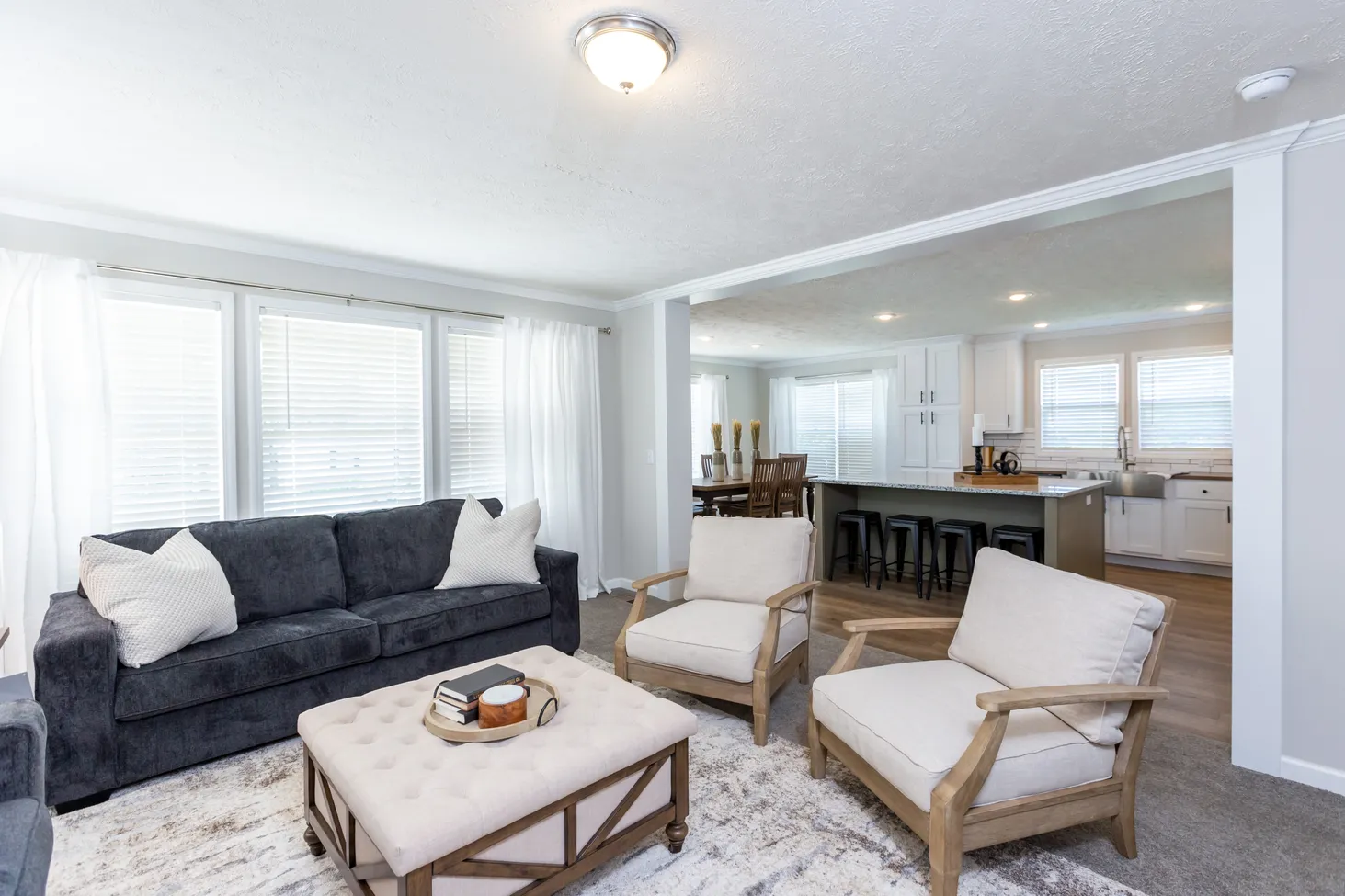 Partially open-concept living room, kitchen, and dining room