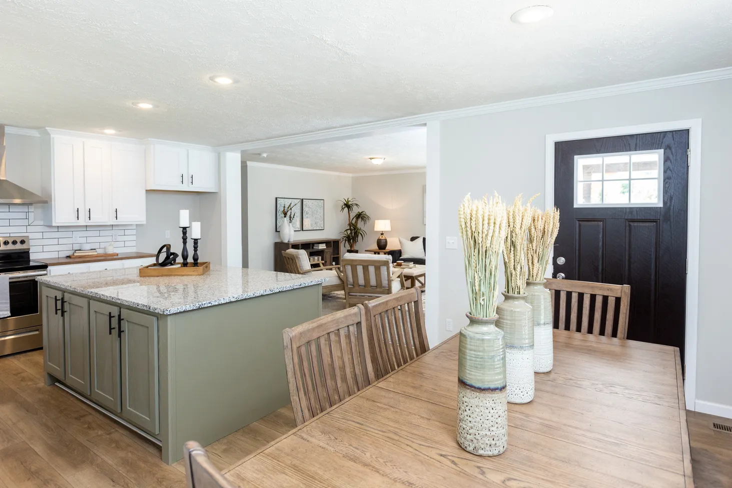 Open concept space with dining room, kitchen, and living room