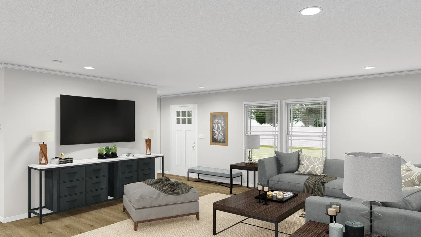 Modern, clean living room with white walls